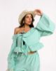 Picture of teal ruffled top
